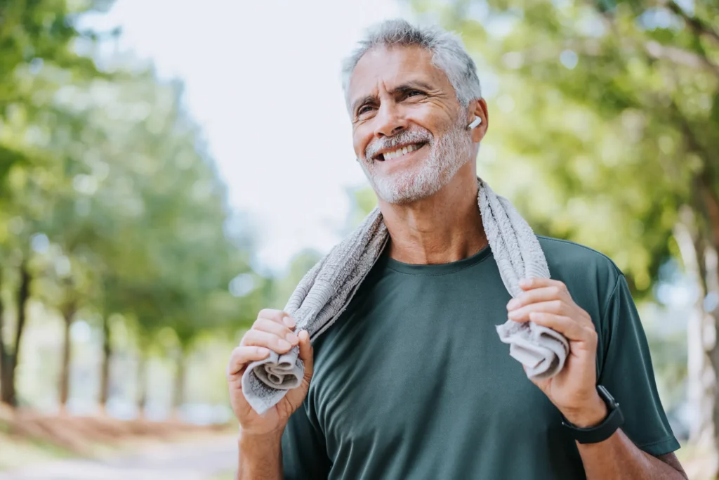 Man with towel over his neck